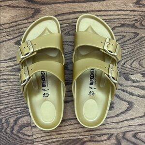 Birkenstock Gold Sandals with Adjustable Straps and Contoured Footbed